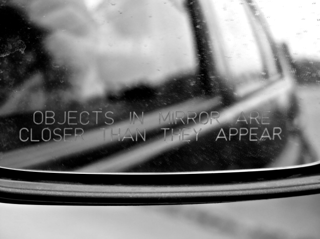 OBJECTS IN MIRROR ARE CLOSER THAN THEY APPEAR